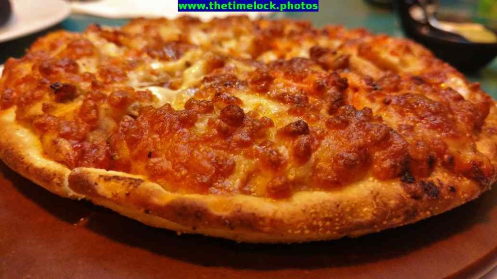 tossin pizza baani square